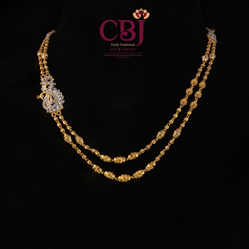 Simple 2 line DD ball chain featuring a side pendant made of CZ stones.