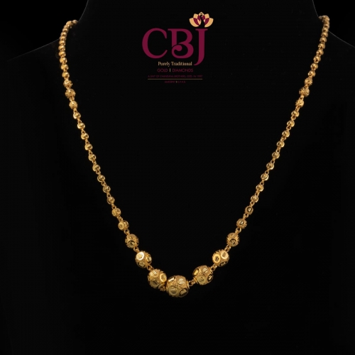 Pure 22K gold chain featuring golden balls.