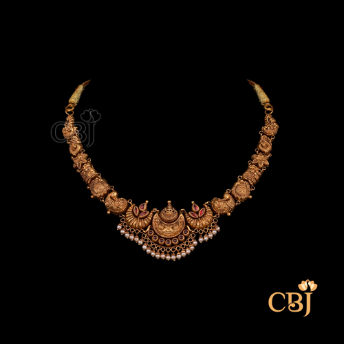 8 grams antique Nakshi short gold necklace with compact traditional detailing and a rich gold finish.