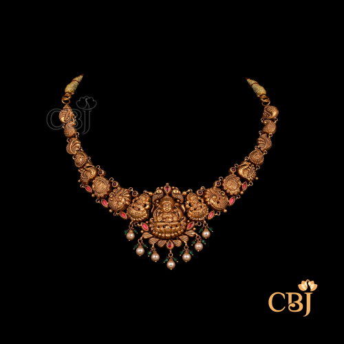 10 grams antique Nakshi short gold necklace featuring intricate traditional patterns, antique finish, and compact styling.