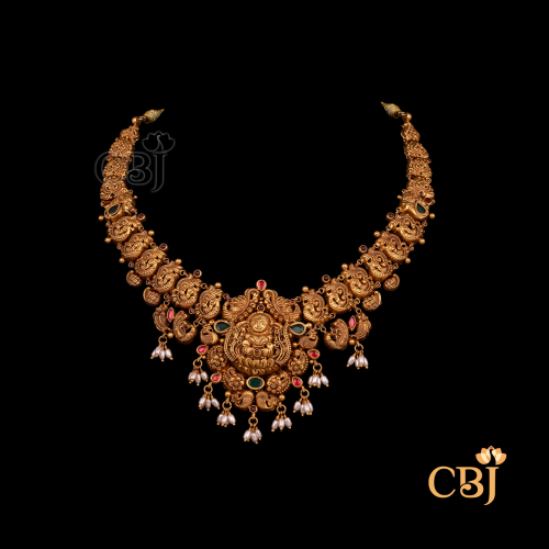 21 grams antique lightweight Nakshi necklace shown as a gold necklace with embossed Nakshi patterns, antique finish, and a well-shaped neckline design.