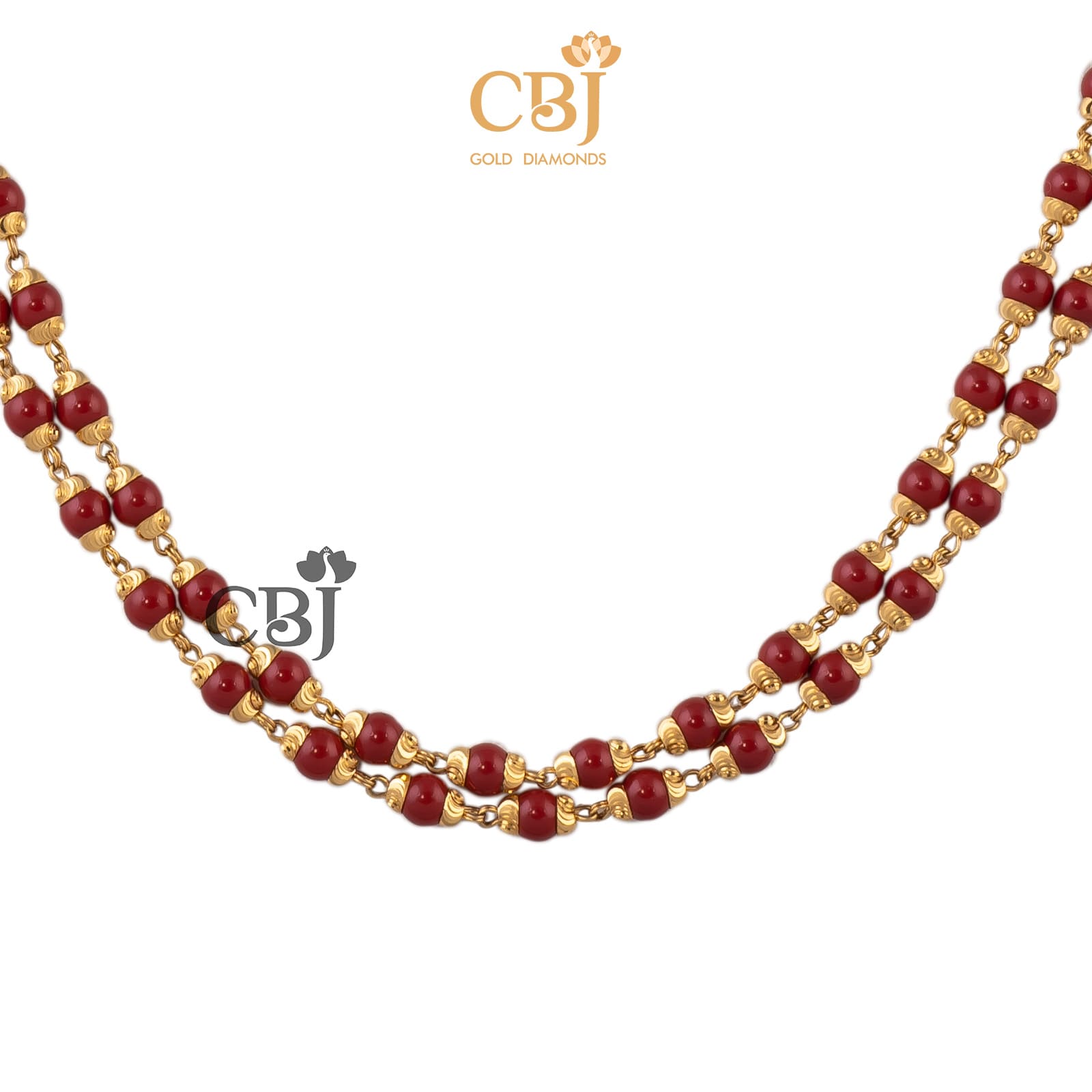 A simple ball mala featuring coral stones.