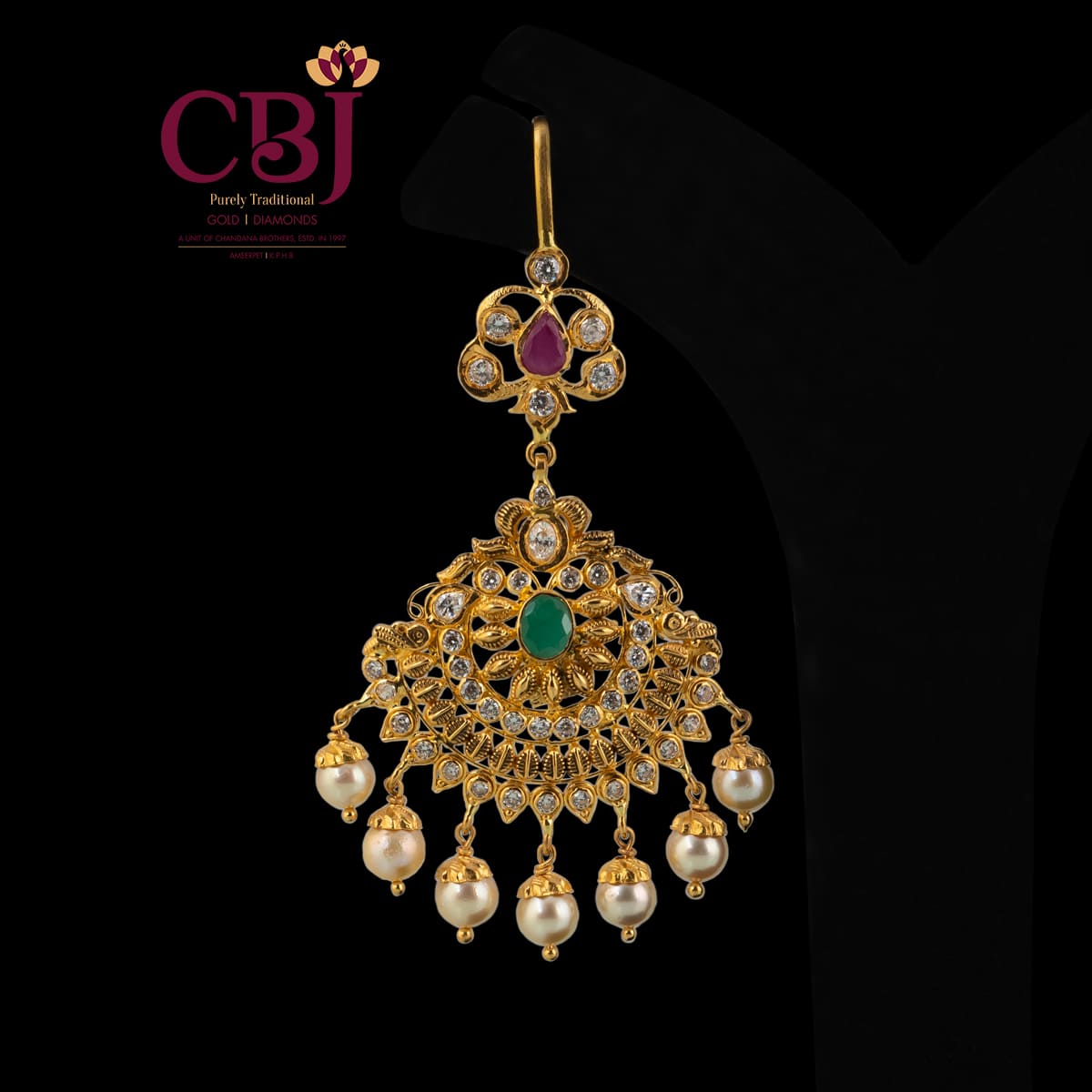 Antique cz tikka featuring rubies