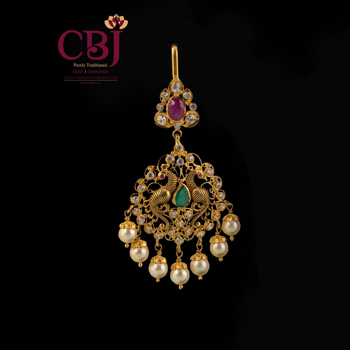Antique maang tikka featuring CZ stones and a peacock design