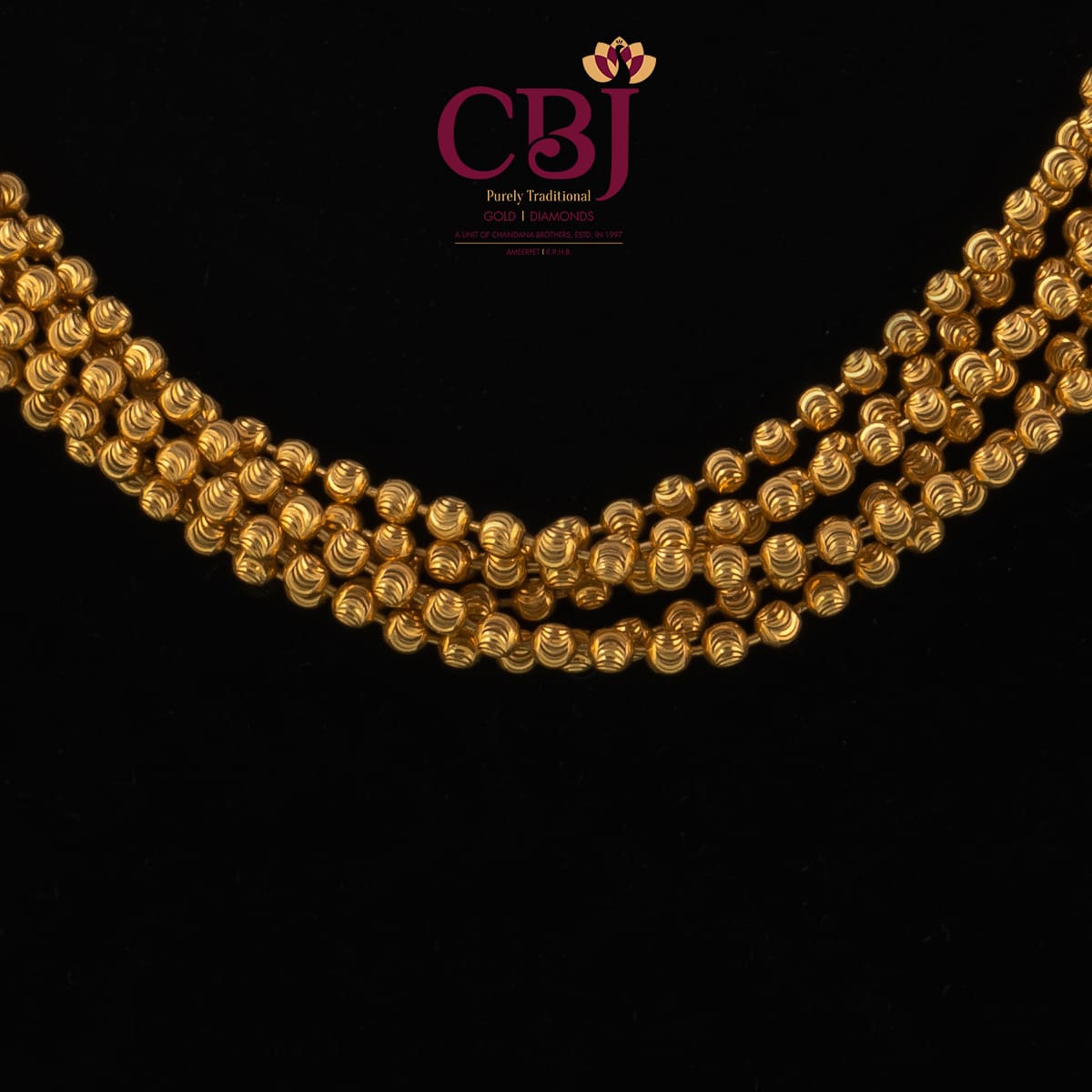 Bunch of gold balls strung together in a chain. A customary traditional wear.