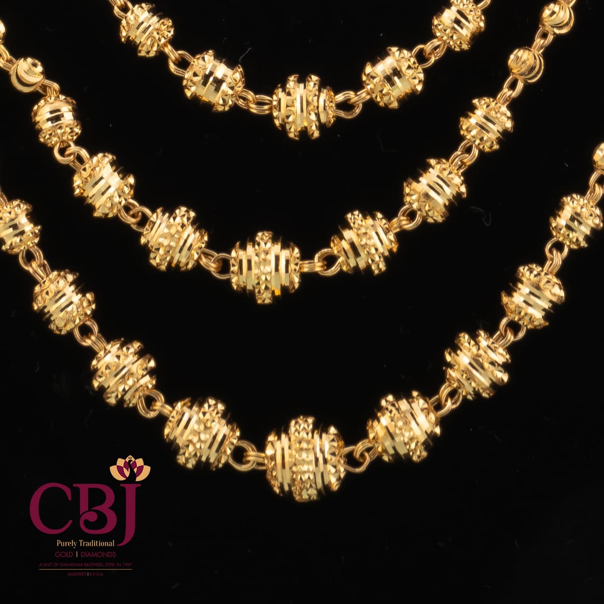 Traditional 3 line ball chain necklace with 2 side pendants feating a peacock design.