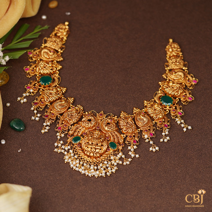 A crafty lightweight 22k gold design complimented by micro-pearls.