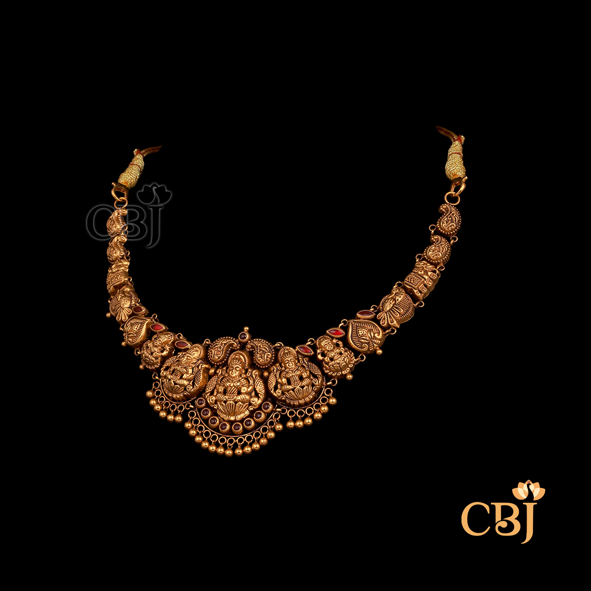 Antique 10 grams Nakshi short gold necklace with intricate surface detailing