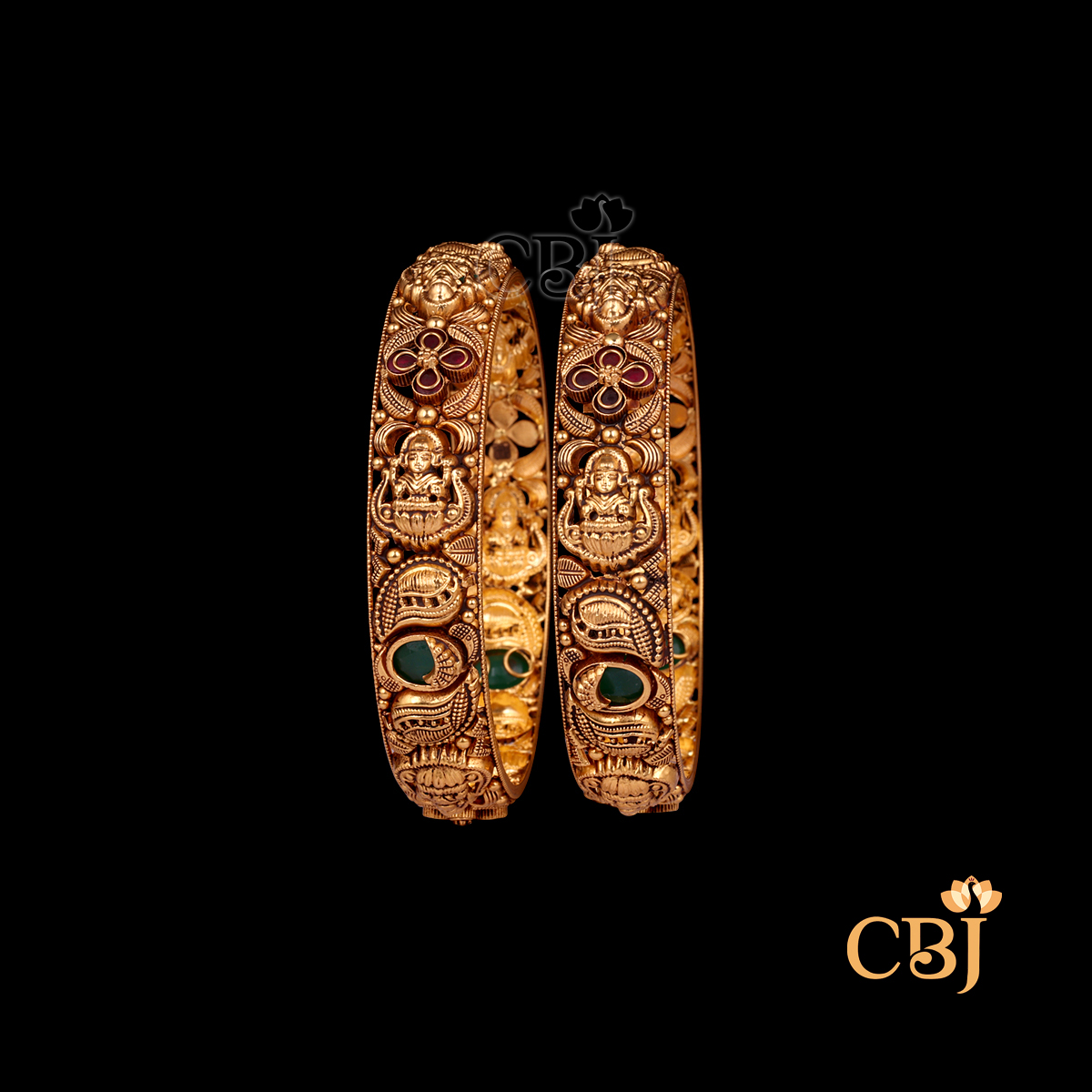29 grams Nakshi Antique Bangles displayed as a pair of gold bangles with temple-style Nakshi carvings and antique finish