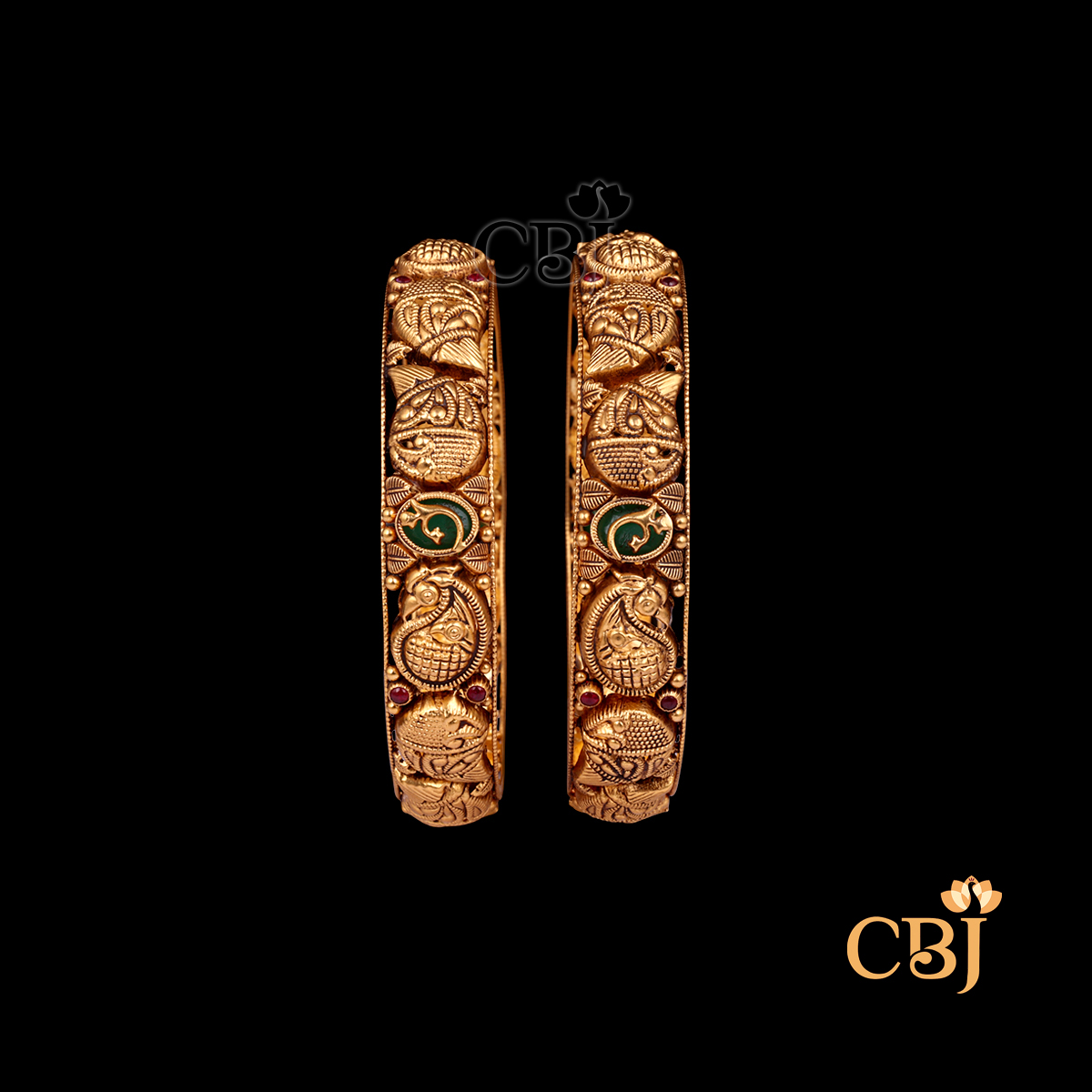 26 grams Nakshi Antique Bangles shown as a pair of gold bangles with intricate Nakshi carvings