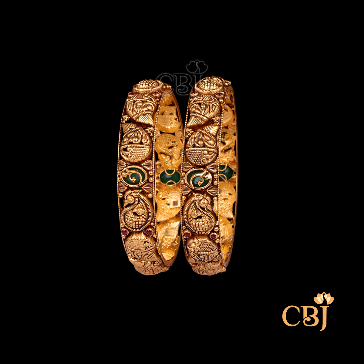 26 grams Nakshi Antique Bangles shown as a pair of gold bangles with intricate Nakshi carvings