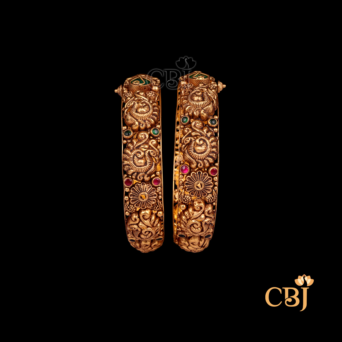 38 grams Nakshi Antique Bangles displayed as a pair of traditional gold bangles with intricate Nakshi carving work