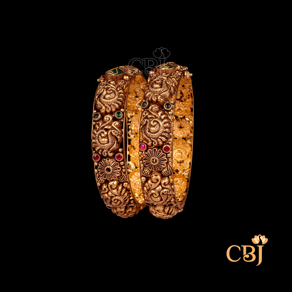 38 grams Nakshi Antique Bangles displayed as a pair of traditional gold bangles with intricate Nakshi carving work